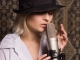 Playback MP3 Never Gonna Give You Up - Karaoke MP3 strumentale resa famosa da Karen Souza